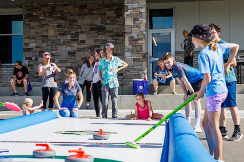 Kids and Curlers enjoying the StreetCurl at the Colorado Curling Cup